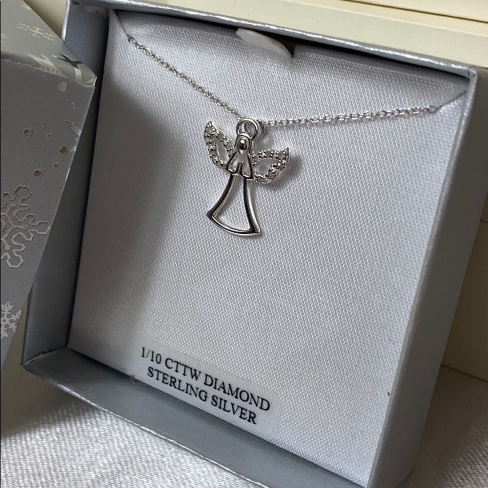 New 1/10 CTTW diamomd sterling silver necklace